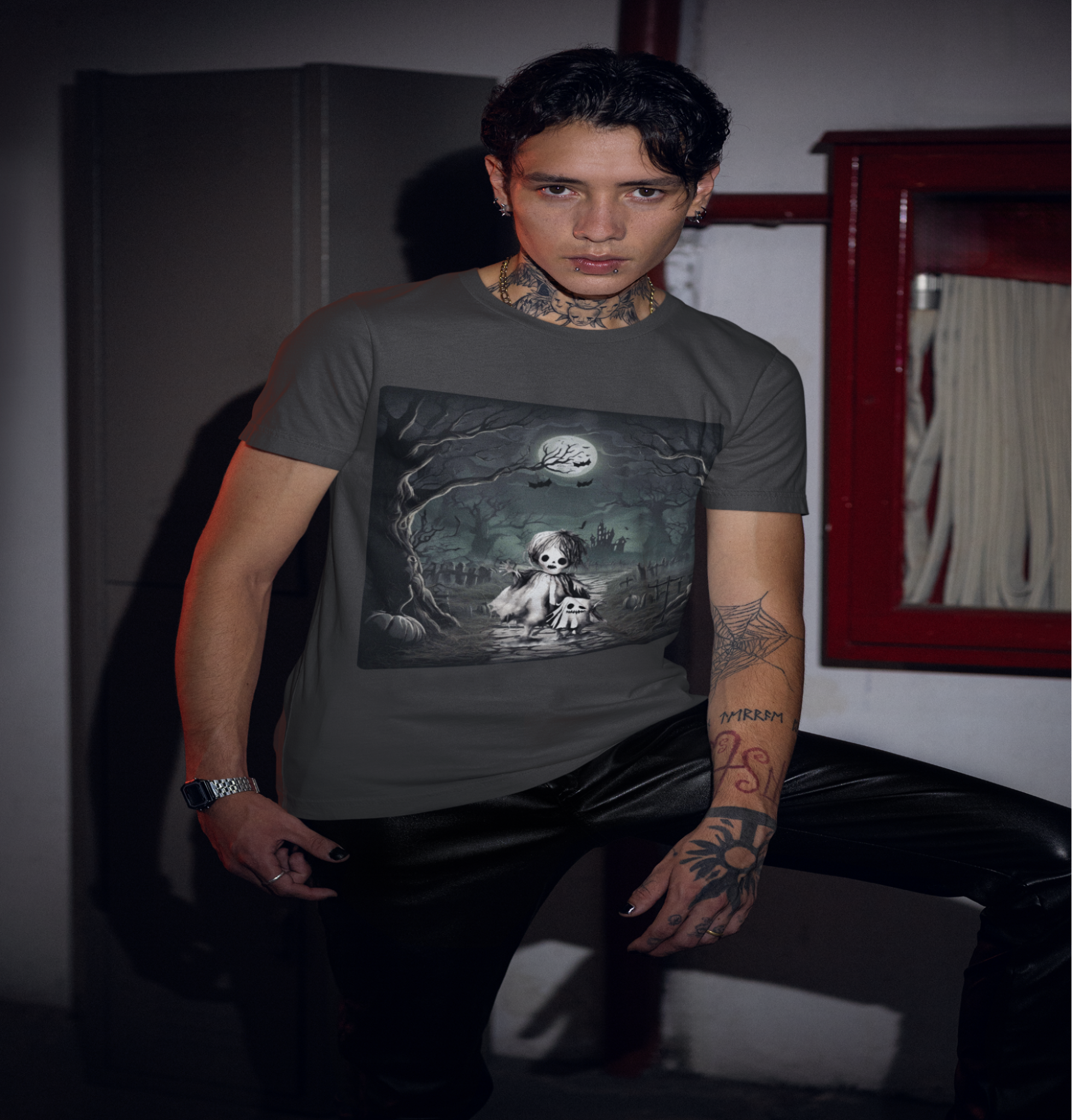 Person wearing a t-shirt with a graphic design of a dog and a child in a dark room.