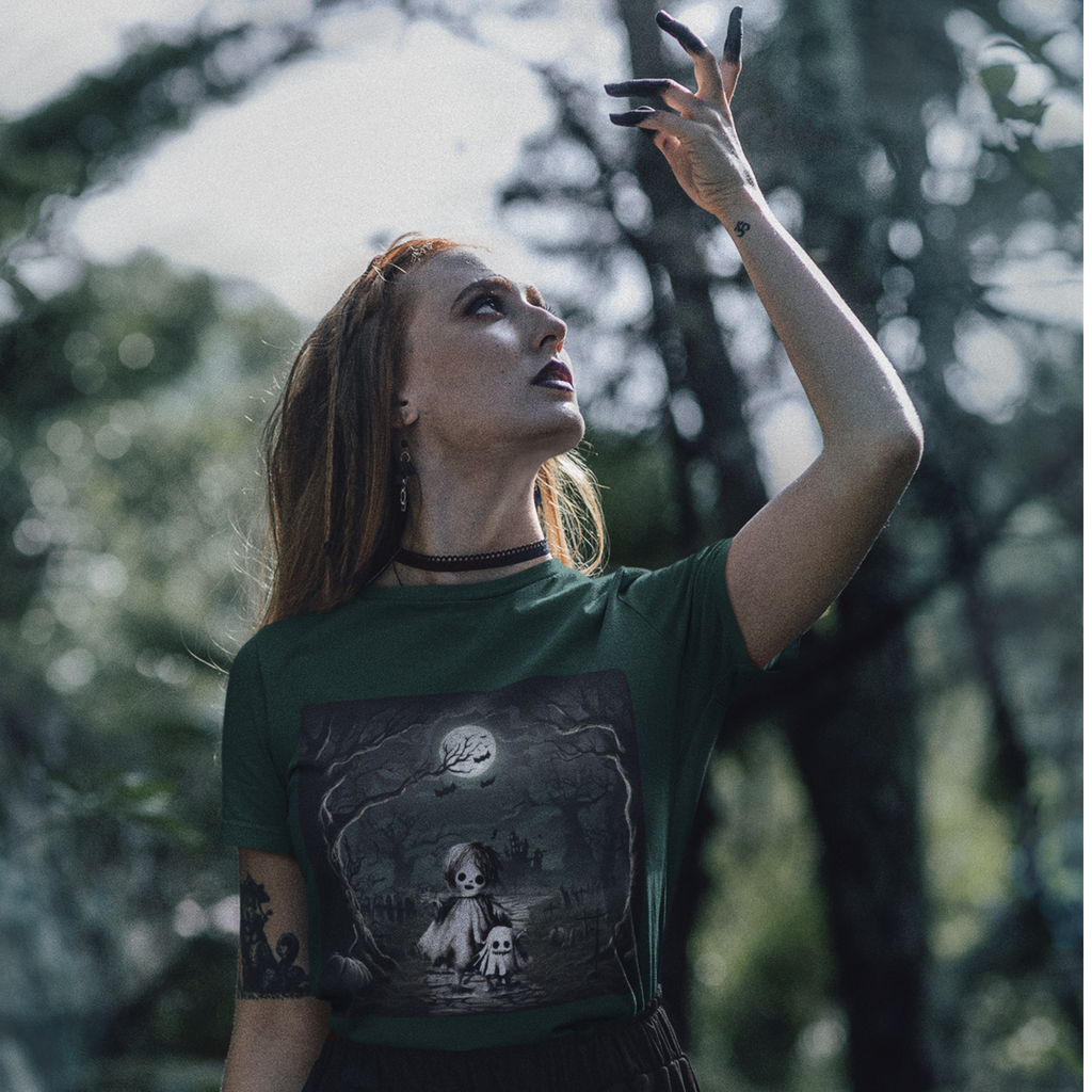 Woman wearing a green t-shirt with a graphic design outdoors